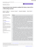 Seasonal body mass dynamics mediate life-history trade-offs in a hibernating mammal